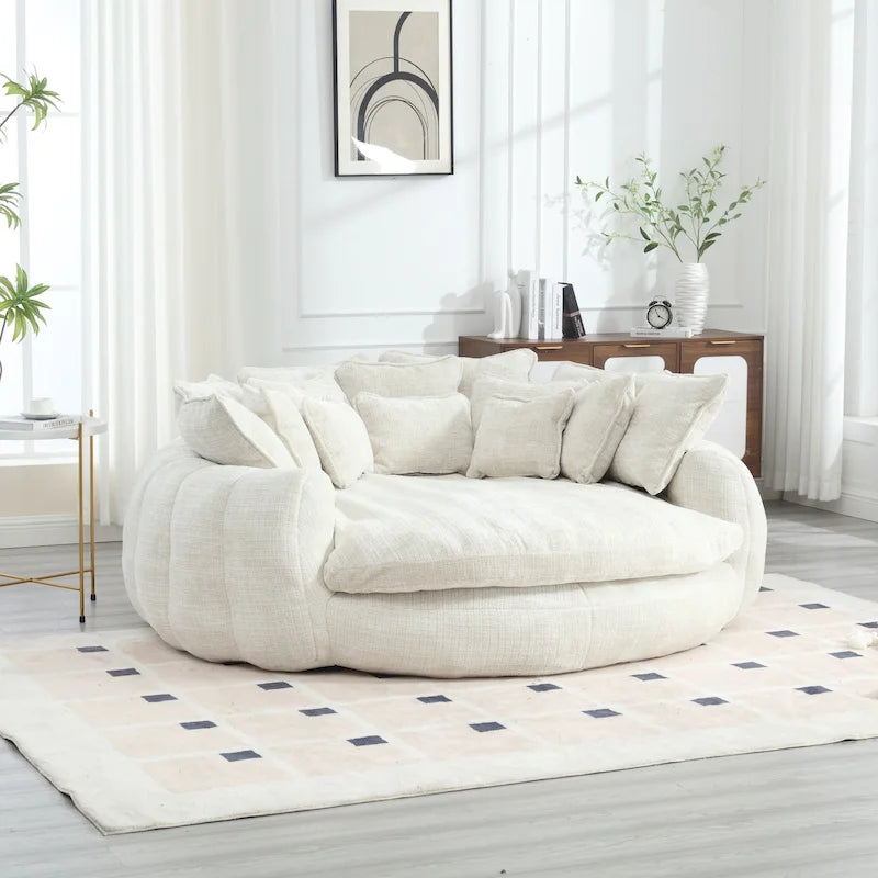 Canapé-lit rond surdimensionné en chenille avec accoudoirs et coussins décoratifs