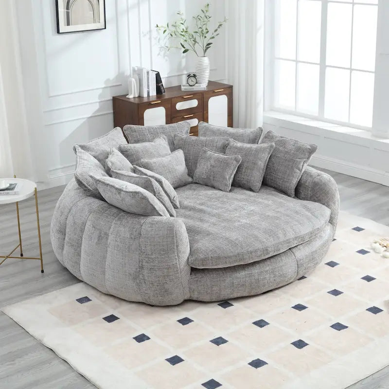 Canapé-lit rond surdimensionné en chenille avec accoudoirs et coussins décoratifs