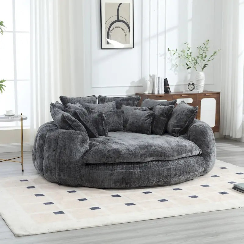 Canapé-lit rond surdimensionné en chenille avec accoudoirs et coussins décoratifs